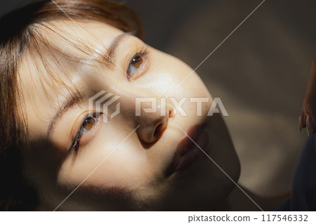 Beauty image of a woman lying on her back 117546332