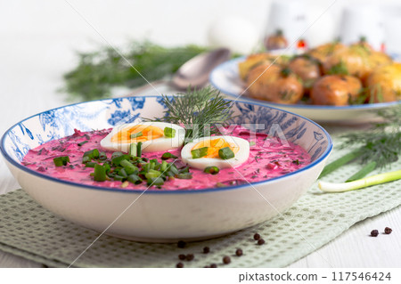 Cold beetroot soup (borscht) with boiled egg. Cold beetroot soup (borscht) with boiled egg. 117546424