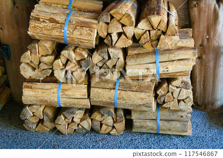 A lot of firewood piled up A lot of firewood piled up 117546867