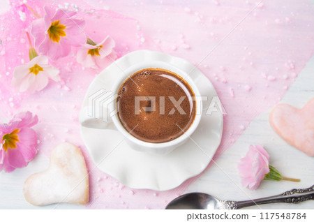 Cup of coffee and heart shaped cookie 117548784