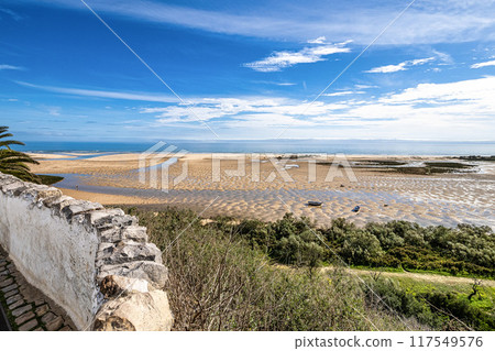 The beach of Cacela Velha in the Algarve region of southern Portugal. 117549576