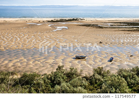 The beach of Cacela Velha in the Algarve region of southern Portugal. 117549577
