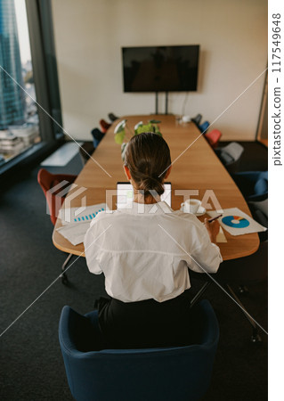 A Business Meeting in a Modern Office Focused on Collaboration and Strategic Planning 117549648