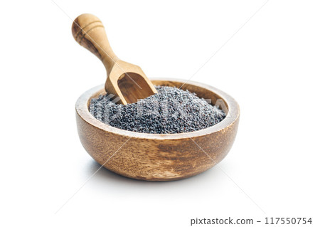 Dry poppy seed in bowl isolated on white background. Dry poppy seed in bowl isolated on white background. 117550754