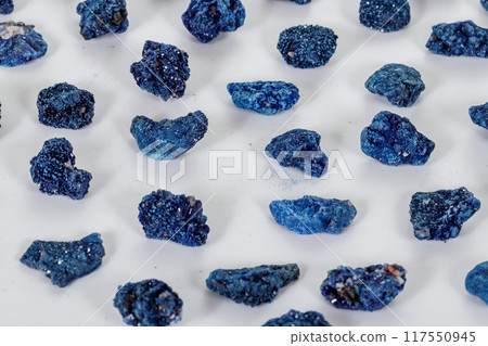 Macro mineral stone Malachite and Azurite against white background 117550945