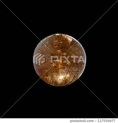 Ball of quartz with rutile on a black background Ball of quartz with rutile on a black background 117550977