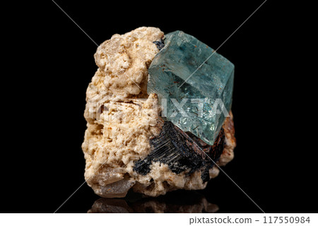 macro mineral stone aquamarine on a black background macro mineral stone aquamarine on a black background 117550984