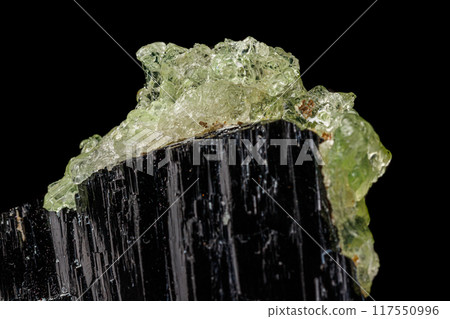 Macro stone Hyalite mineral, tourmaline Sherl, smoky quartz on a black background Macro stone Hyalite mineral, tourmaline Sherl, smoky quartz on a black background 117550996