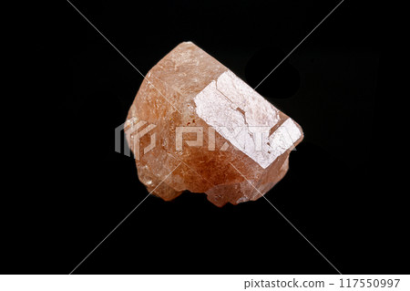 macro mineral garnet stone on a black background macro mineral garnet stone on a black background 117550997