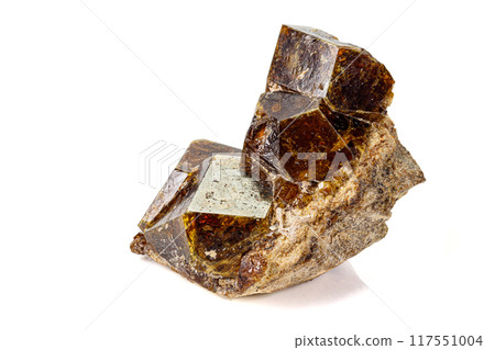 Macro stone Grossular mineral on white background Macro stone Grossular mineral on white background 117551004
