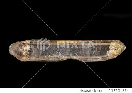 Macro mineral stone smoky quartz, rauchtopaz on a black background 117551284