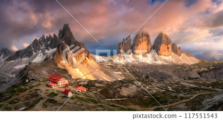 Aerial view of mountains, beautiful house and church at sunset 117551543