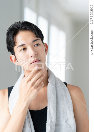 Young men doing skin care Young men doing skin care 117551665