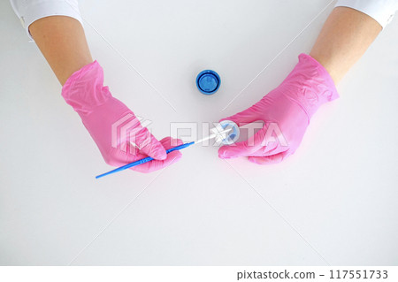 A brush for taking a swab from the cervical canal of the female  organs for examination for the presence of cancer cells 117551733