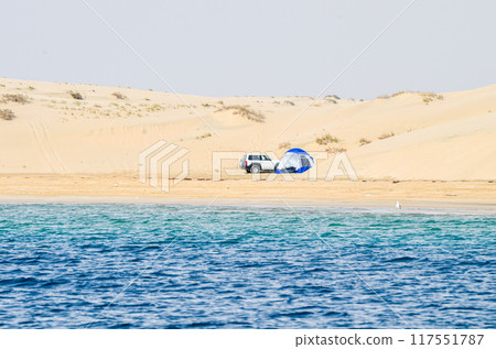 Camping on the Sand dunes descending into the creek Camping on the Sand dunes descending into the creek 117551787
