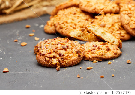 Crunchy almond cookies, freshly baked and ready to satisfy your sweet cravings 117552173