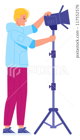 Light worker on cinema production studio. Professional worker Light worker on cinema production studio. Professional worker 117552576