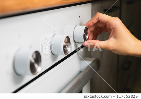 Using the Oven, oven temperature control closeup 117552829