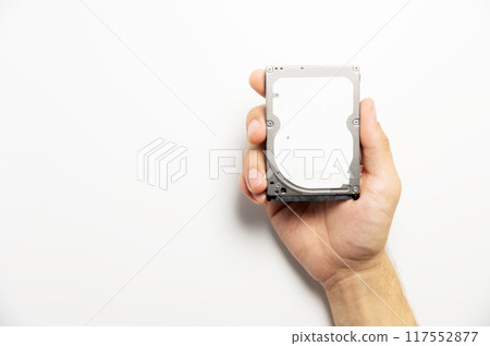 hard drive in a man's hand. Data repair and recovery concept hard drive in a man's hand. Data repair and recovery concept 117552877