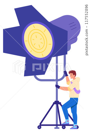 Man with stage spotlight. Electric lamp scene worker 117552896
