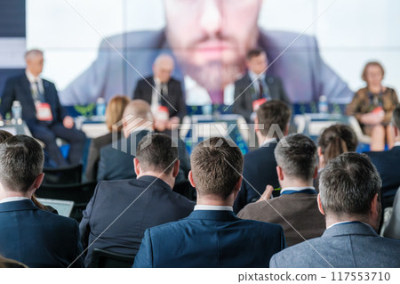 Business conference with professionals and audience in auditorium 117553710