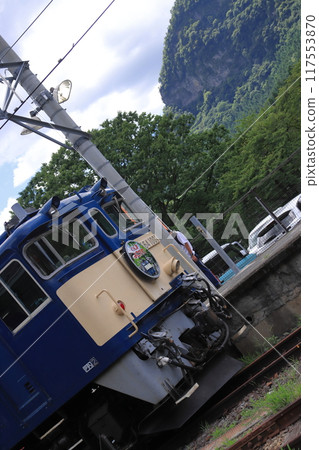 EF64-1001 locomotive stops at Yokokawa Station with the rugged Myogi mountains in the background_Photo taken on August 17, 2024 EF64-1001 locomotive stops at Yokokawa Station with the rugged Myogi mountains in the background_Photo taken on August 17, 2024 117553870