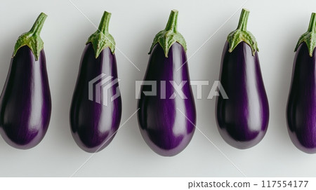 A row of eggplants lined up on a white surface, AI 117554177