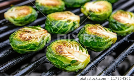 A close up of a grill with brussel sprouts on it, AI 117554561