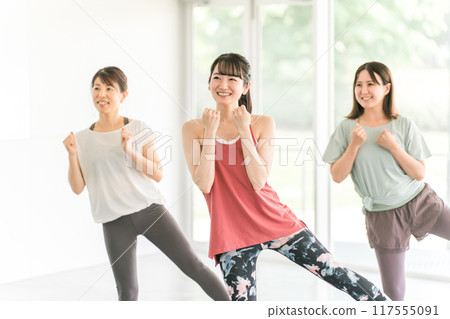 Women doing dance and aerobic lessons at the gym 117555091