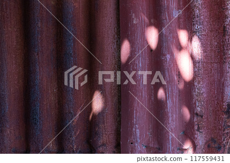 The texture of a rusty zinc wall weathered by the weather The texture of a rusty zinc wall weathered by the weather 117559431