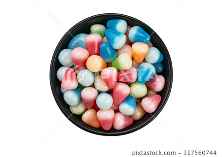 Top view of colorful sugar coated crispy jelly in black ceramic bowl. Top view of colorful sugar coated crispy jelly in black ceramic bowl. 117560744
