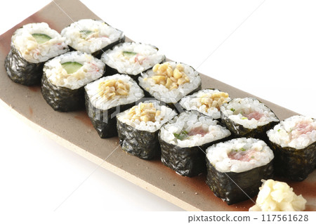 Assorted sushi rolls photographed on a white background Assorted sushi rolls photographed on a white background 117561628
