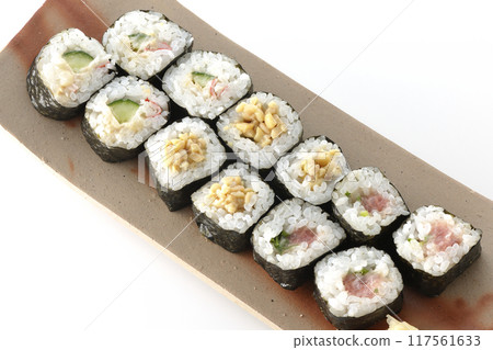 Assorted sushi rolls photographed on a white background 117561633