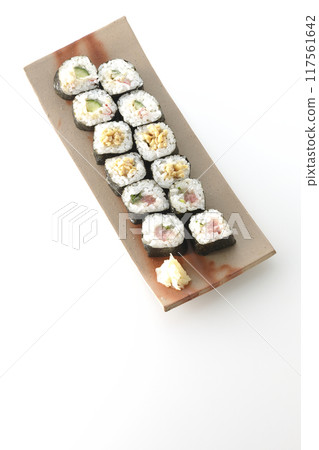 Assorted sushi rolls photographed on a white background 117561642