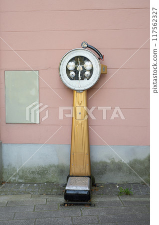 a scale weighs people in Linz, Austria 117562327
