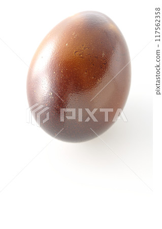Smoked eggs photographed on a white background Smoked eggs photographed on a white background 117562358