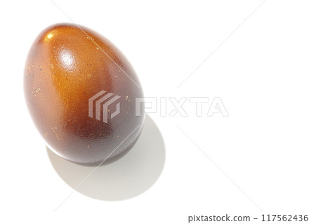 Smoked eggs photographed on a white background Smoked eggs photographed on a white background 117562436