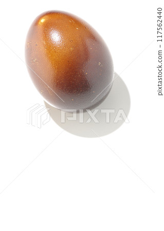 Smoked eggs photographed on a white background Smoked eggs photographed on a white background 117562440