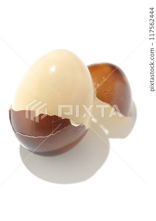 Smoked eggs photographed on a white background 117562444