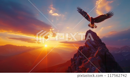 Majestic golden eagle soaring the sky above high rocky mountain in the evening or morning 117562742