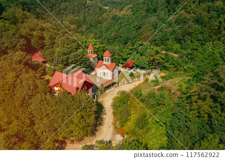 A Stunning and Scenic Aerial View of a Beautiful male monastery That is Surrounded by Lush, Greenery 117562922