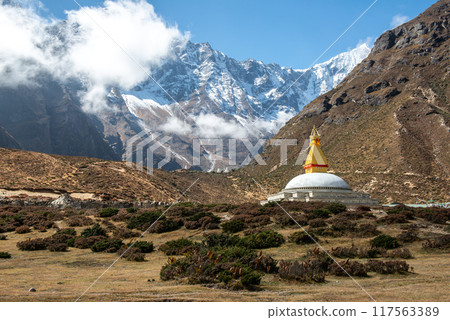 Tibetan Buddhist stupa in Thame, a traditional Sherpa village, is located at an altitude of around 3,800 meters (12,470 feet) in the Khumbu Valley of Nepal. 117563389