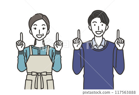 A man and a woman in their 40s or 50s pointing up 117563888