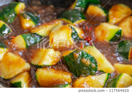 Stir-fried zucchini with thickened sauce - One-pan dish Stir-fried zucchini with thickened sauce - One-pan dish 117564928