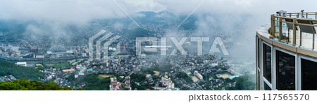 Panorama of Nagasaki cityscape shrouded in mist and clouds from the Inasayama Observatory [Nagasaki City] 117565570