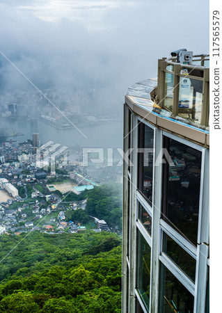 Nagasaki cityscape shrouded in mist and clouds from the Inasayama Observatory [Nagasaki City] 117565579