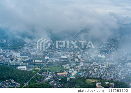 Nagasaki cityscape shrouded in mist and clouds from the Inasayama Observatory [Nagasaki City] 117565590