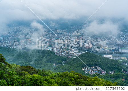 Nagasaki cityscape shrouded in mist and clouds from the Inasayama Observatory [Nagasaki City] 117565602