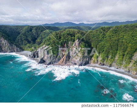 Aerial photography of the overwhelmingly high Uonosu Cliffs in Iwate Prefecture, taken from the sea side by a drone in Tanohata Village 117566674