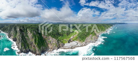 Aerial photography of the overwhelmingly high Uonosu Cliffs in Iwate Prefecture, photographed from the sea side by a drone, Tanohata Village, panorama Aerial photography of the overwhelmingly high Uonosu Cliffs in Iwate Prefecture, photographed from the sea side by a drone, Tanohata Village, panorama 117567508